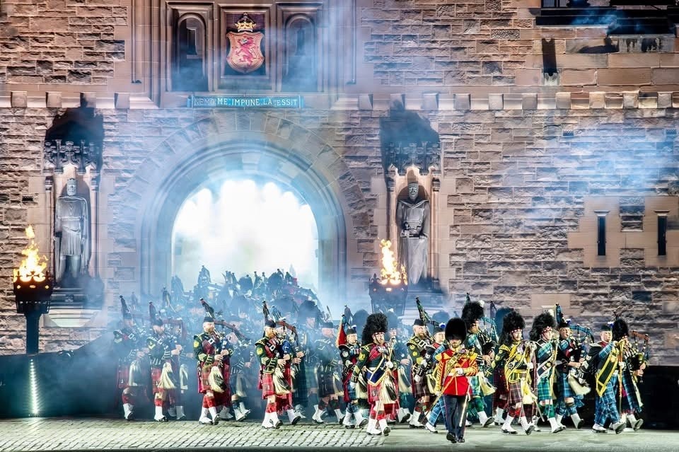 Pipe band marching out through the drawbridge at Edinburgh Castle